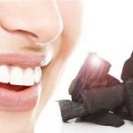 Teeth whitening with activated carbon