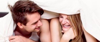 Guy and girl under a blanket